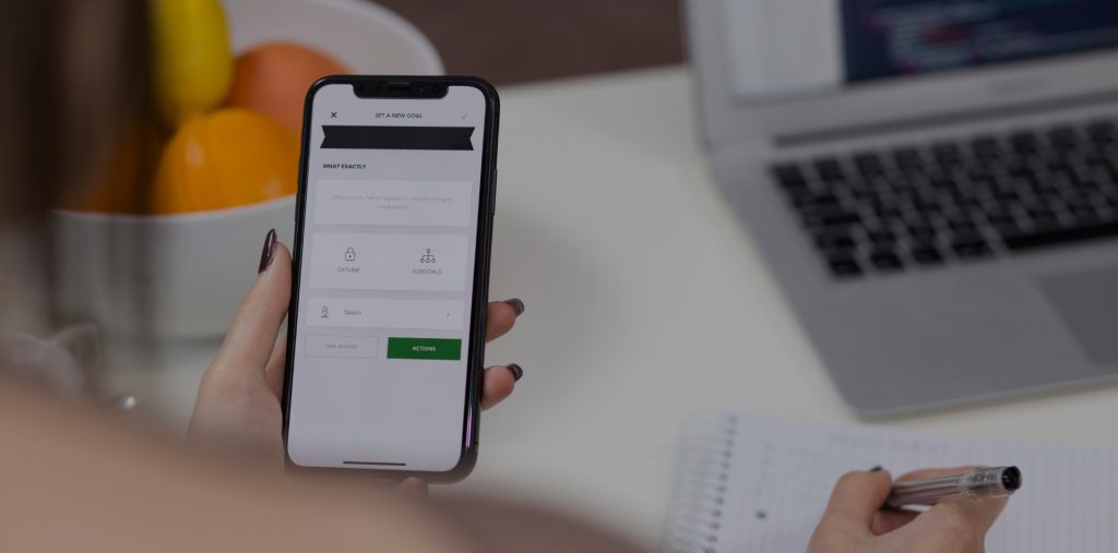 iPhone X with sleek design and edge-to-edge display on a white background